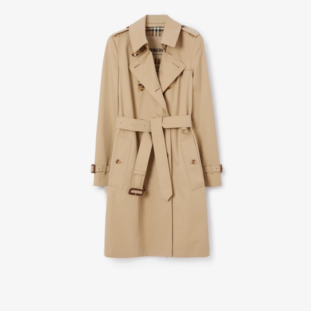 The iconic Burberry trench coat, made in England from shower-resistant gabardine